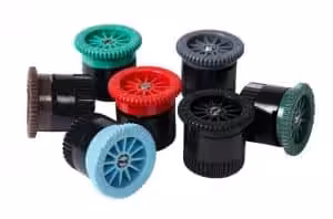 Hunter Pro Spray Nozzles A collection of various irrigation nozzles in different colors and sizes=