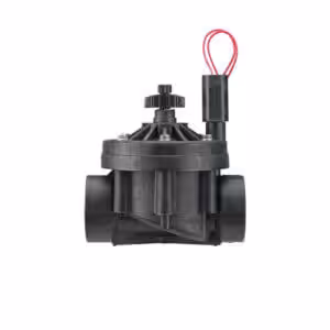 Black irrigation control valve with a red wire and adjustable flow control knob.