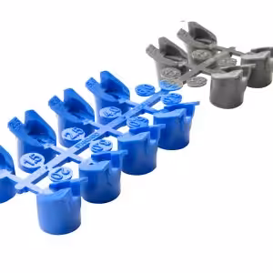 PGP Ultra nozzle set included A series of blue and gray irrigation nozzles arranged in a row on a white background.